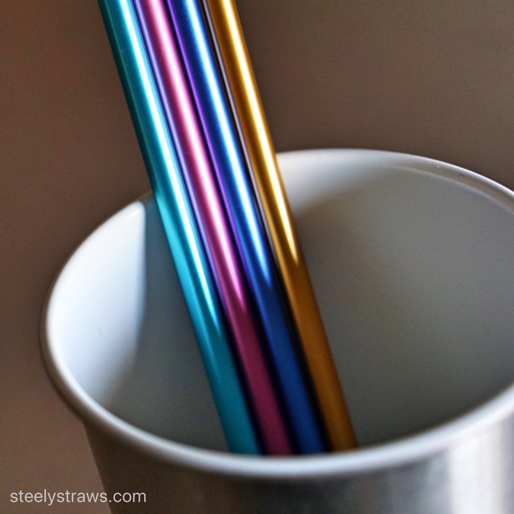 Colorful aluminum cans with straws Stock Photo by ©koya979 15878355